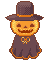 Cute, floating figure with a jack-o-lantern for a head. They are wearing a dark cape and hat.