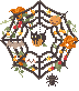 Spiderweb wreath with candy and pumpkins stuck in it. A cat sits in a jack-o-lantern in the middle, 
              and a spider hangs from the bottom.